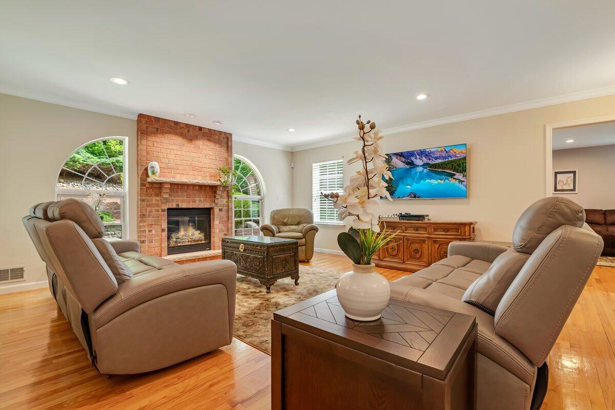 1376 Buck Ridge Drive Stroudsburg, PA 18360 - Photo 11 of 56 a living room with furniture and a fireplace