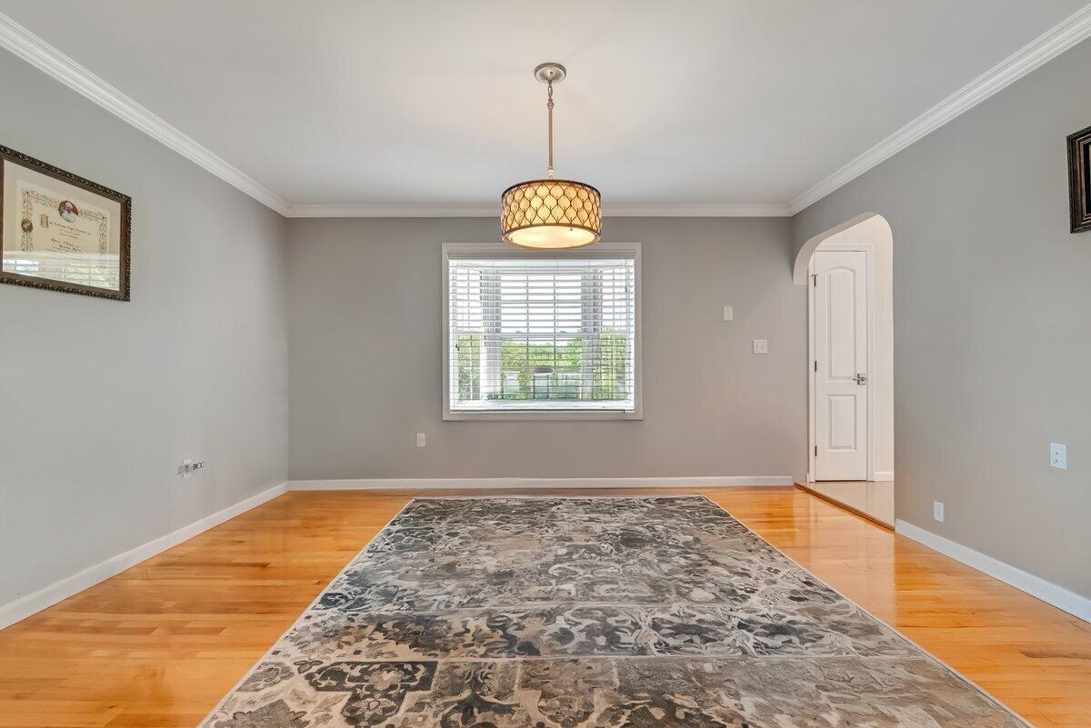 1376 Buck Ridge Drive Stroudsburg, PA 18360 - Photo 18 of 56 a view of an empty room with window and wooden floor