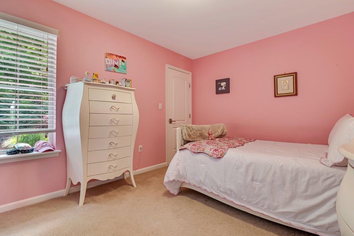 1376 Buck Ridge Drive Stroudsburg, PA 18360 - Photo 31 of 56 a bedroom with a bed and a desk