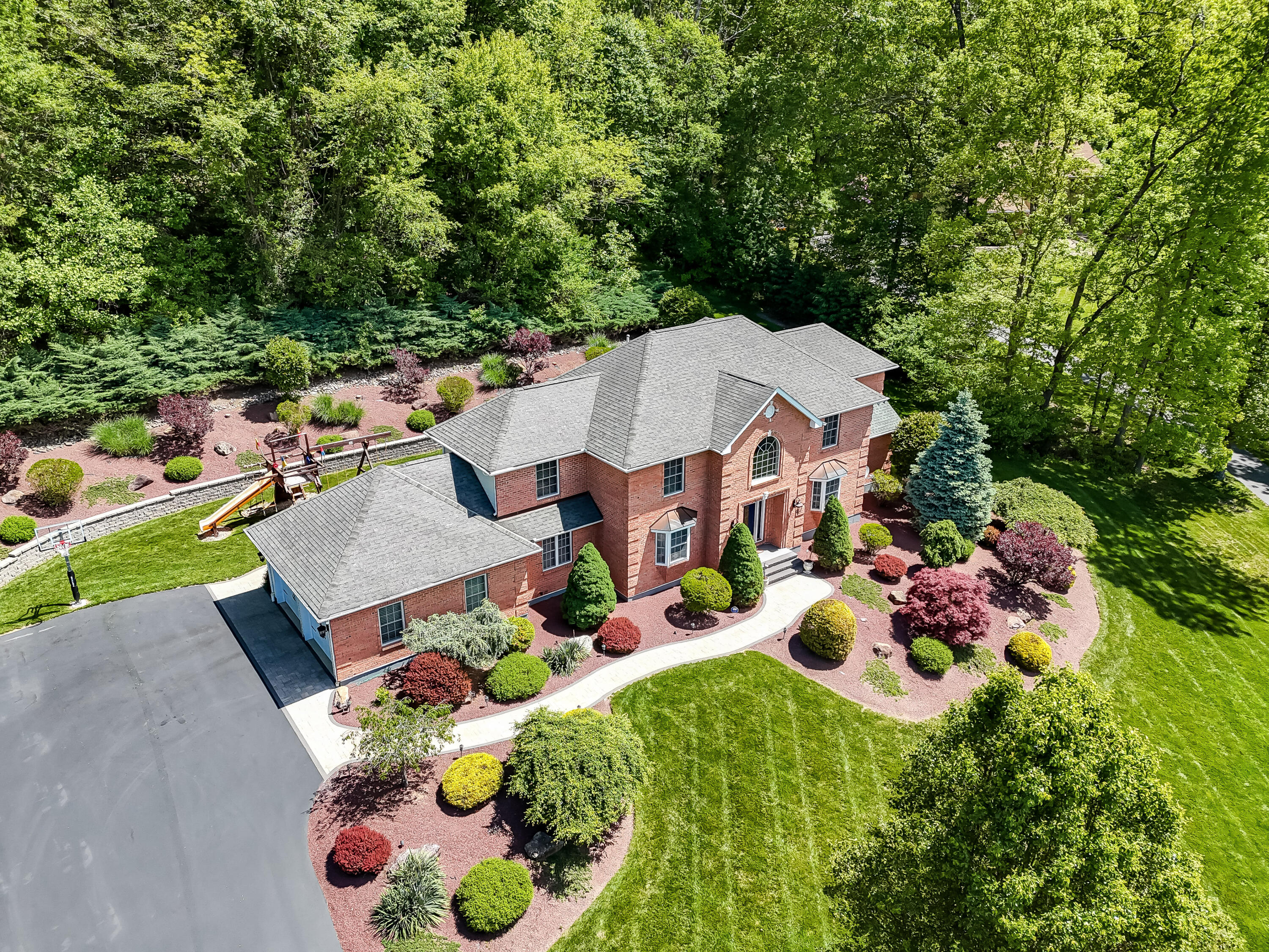 1376 Buck Ridge Drive Stroudsburg, PA 18360 - Photo 45 of 56 an aerial view of a house with yard swimming pool and outdoor seating
