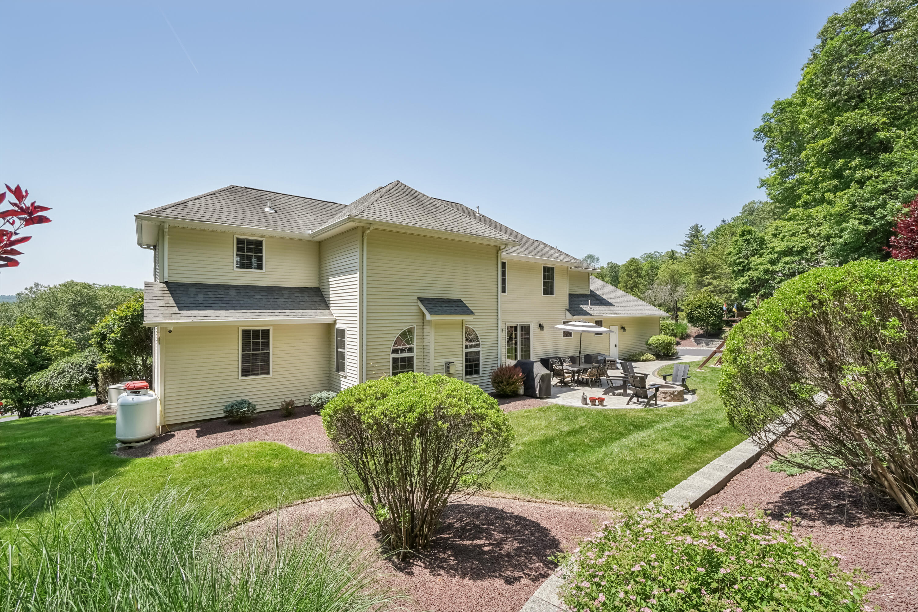 1376 Buck Ridge Drive Stroudsburg, PA 18360 - Photo 49 of 56 a front view of a house with garden