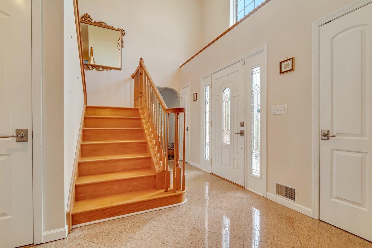 1376 Buck Ridge Drive Stroudsburg, PA 18360 - Photo 8 of 56 a view of staircase with white walls and a window