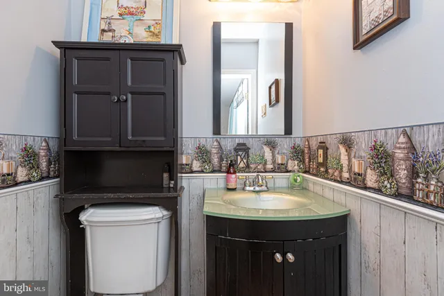 a bathroom with a sink and a toilet