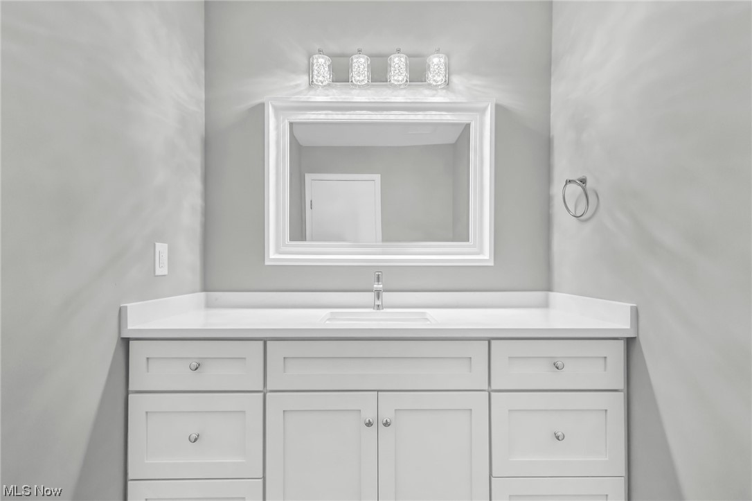 18230 Egbert Road Walton Hills, OH 44146 - Photo 9 of 34 Newly remodeled half bath located off the kitchen hallway