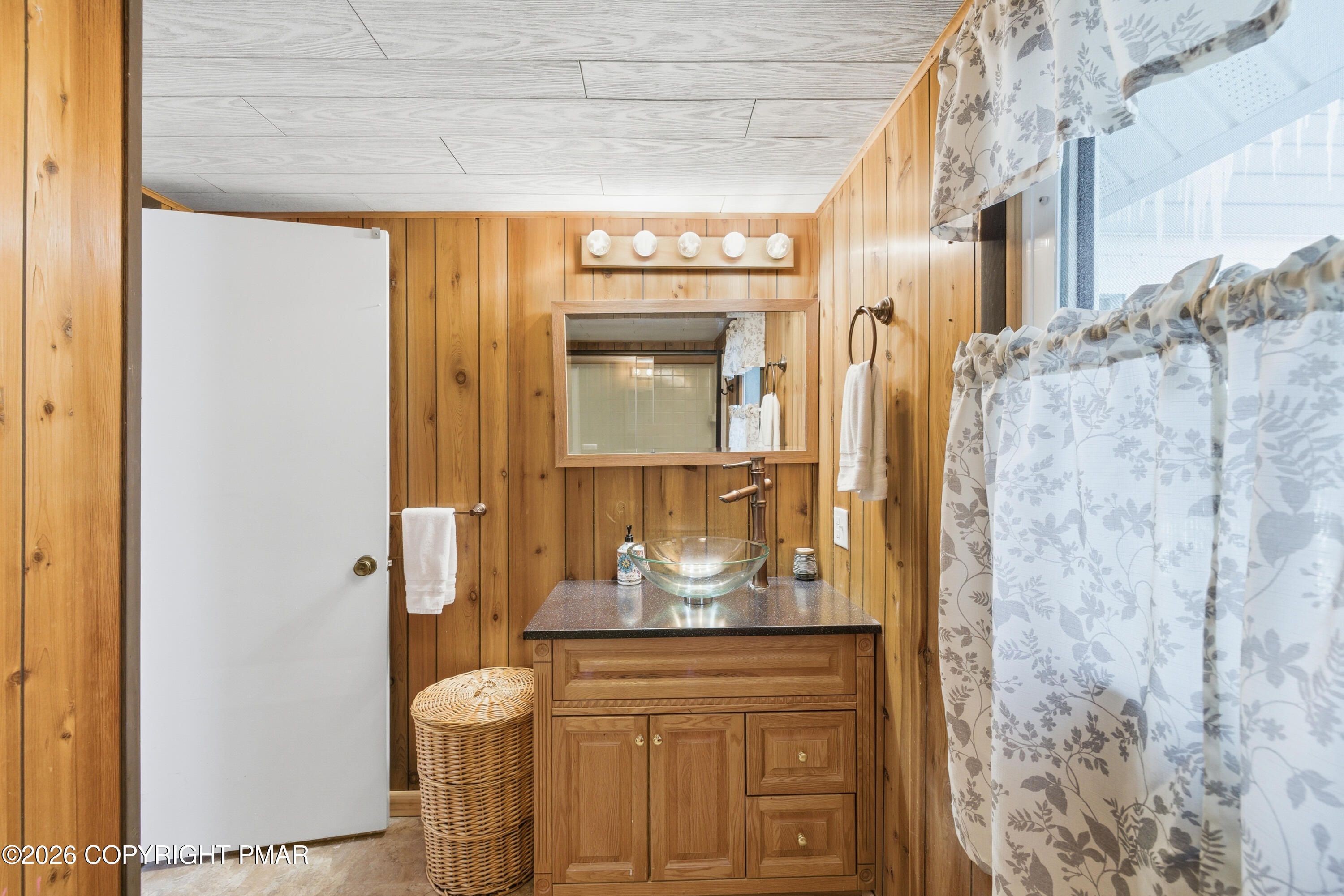 119 Long Woods Road Tobyhanna, PA 18466 - Photo 11 of 27 a bathroom with a granite countertop sink and a mirror