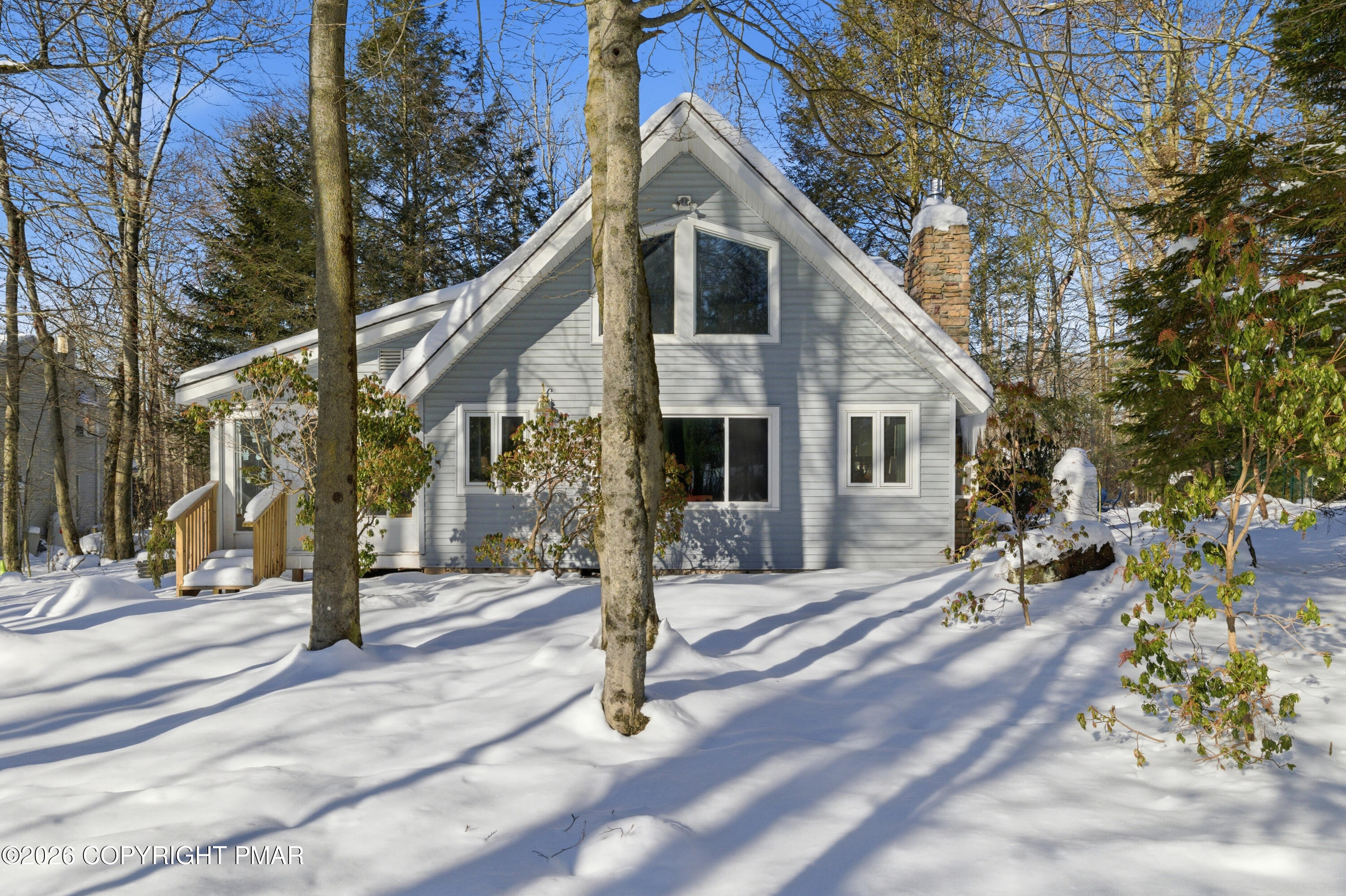 119 Long Woods Road Tobyhanna, PA 18466 - Photo 17 of 27 a front view of a house with a tree