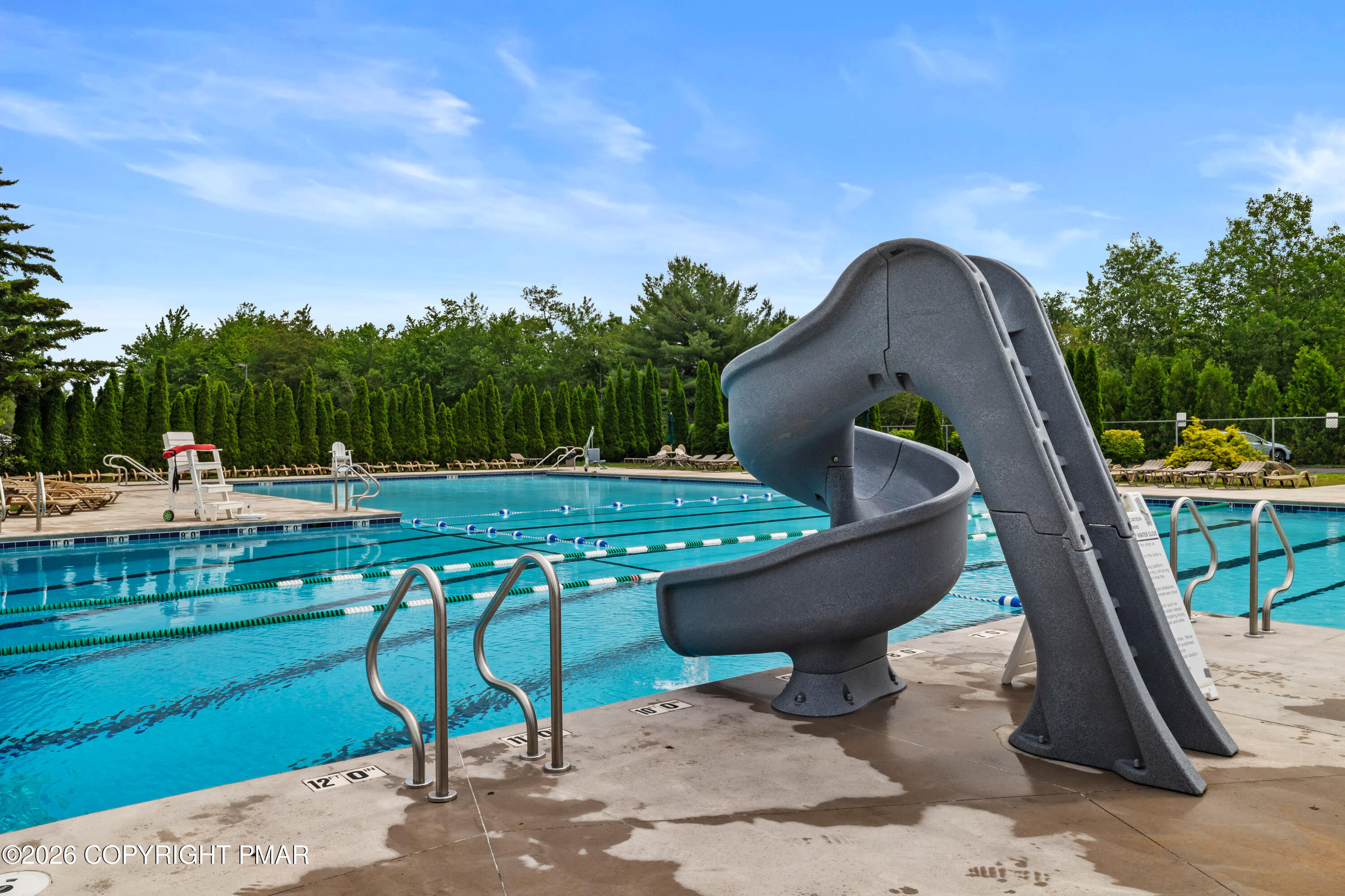 119 Long Woods Road Tobyhanna, PA 18466 - Photo 25 of 27 a swimming pool with barbeque oven and outdoor seating