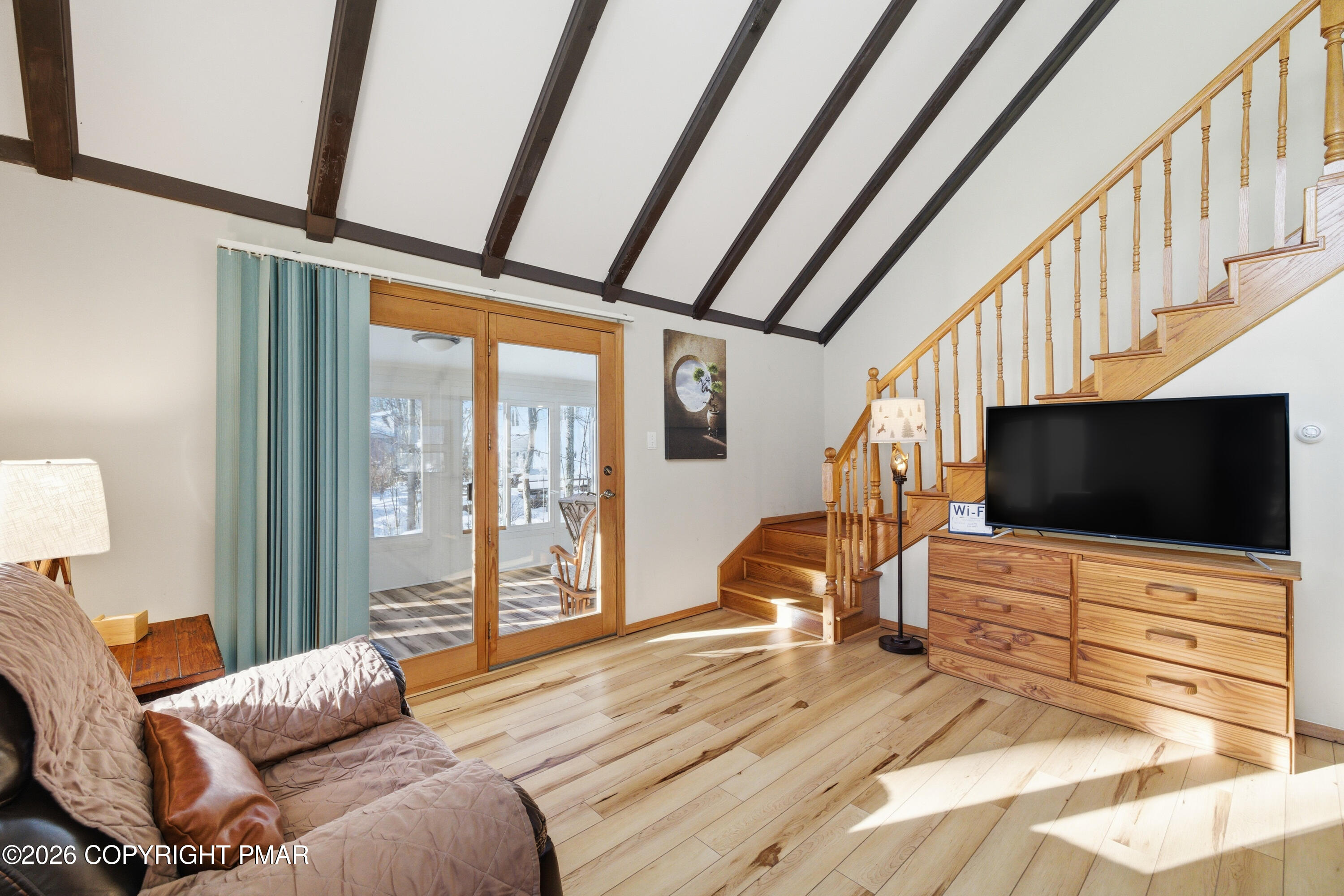 119 Long Woods Road Tobyhanna, PA 18466 - Photo 6 of 27 a bedroom with furniture and a flat screen tv