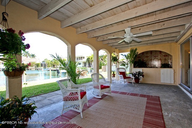 1180 Singer Drive Riviera Beach, FL 33404 - Photo 15 of 16 a view of a porch with furniture