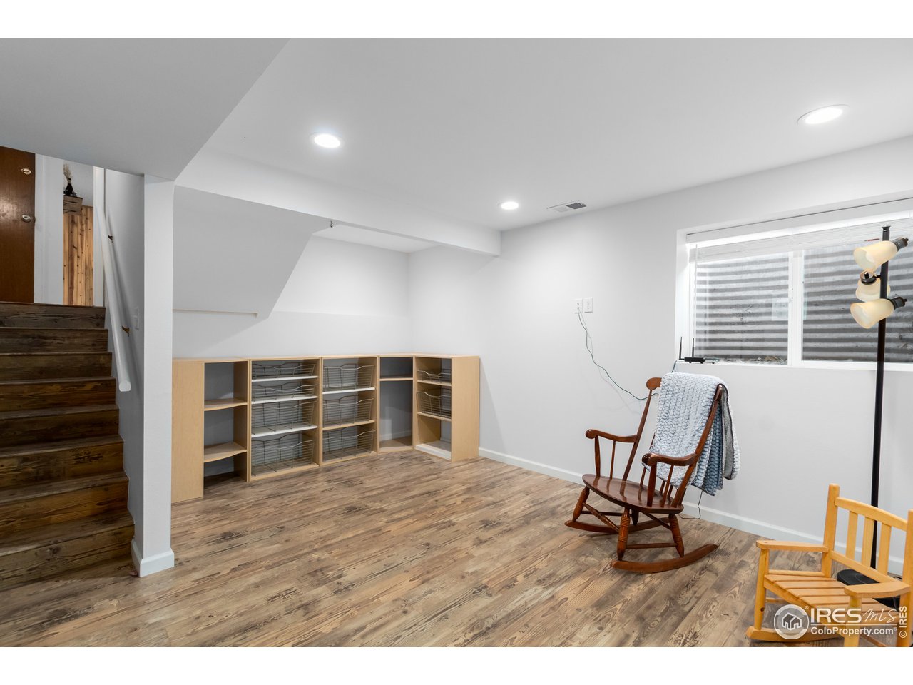 737 Kimball Road Fort Collins, CO 80521 - Photo 22 of 36 Rec room with built-in shelving