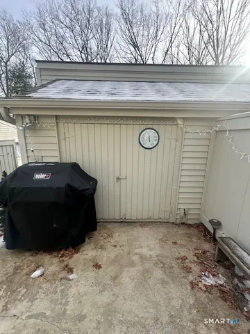 a view of house with garage