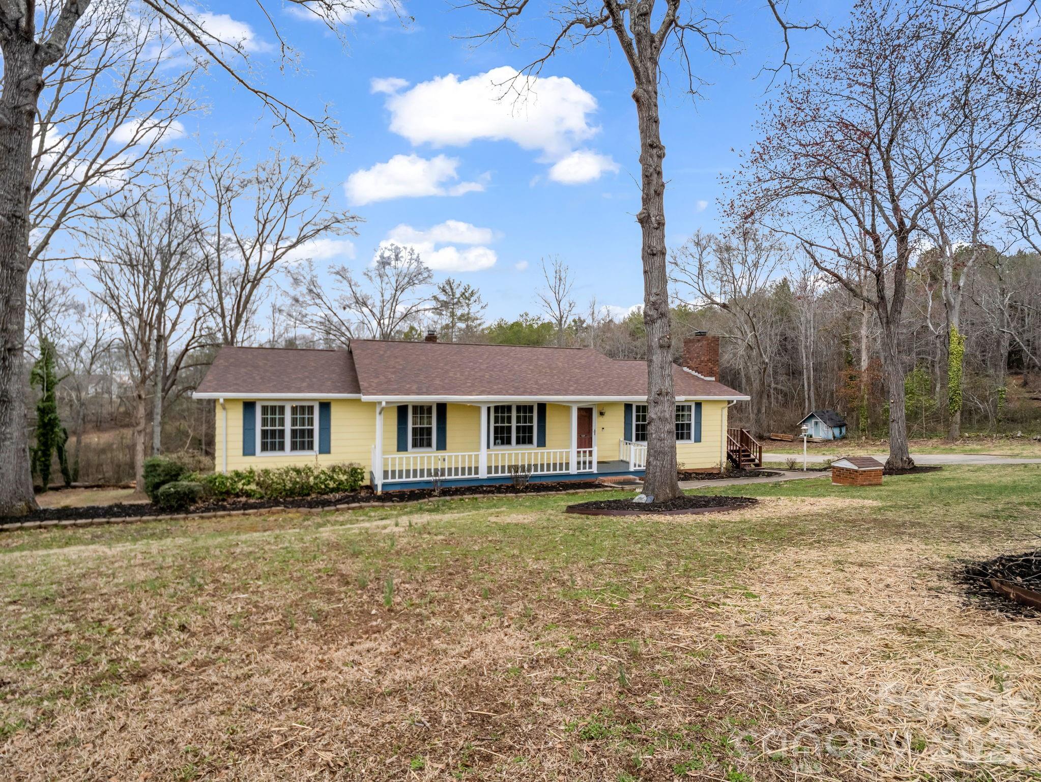 315 Walker Store Road Ellenboro, NC 28040 - Photo 2 of 39 a front view of a house with a yard
