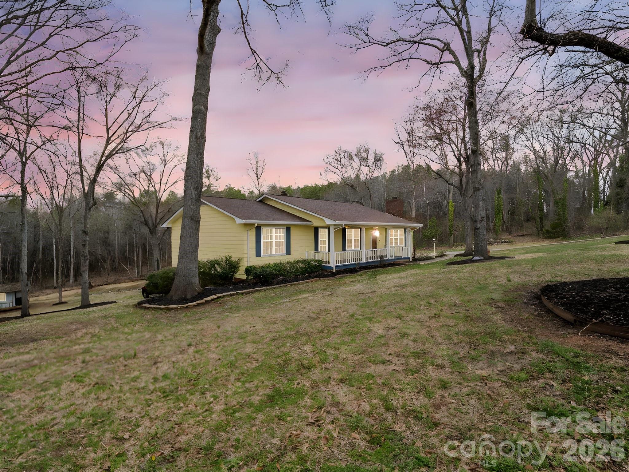 315 Walker Store Road Ellenboro, NC 28040 - Photo 3 of 39 a front view of a house with a yard