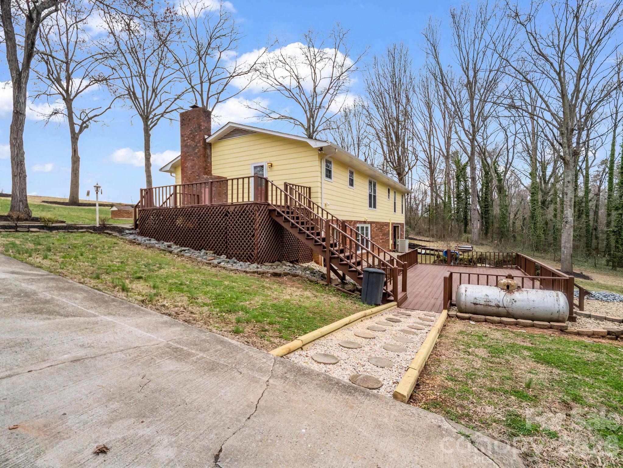 315 Walker Store Road Ellenboro, NC 28040 - Photo 31 of 39 a view of a house with a yard
