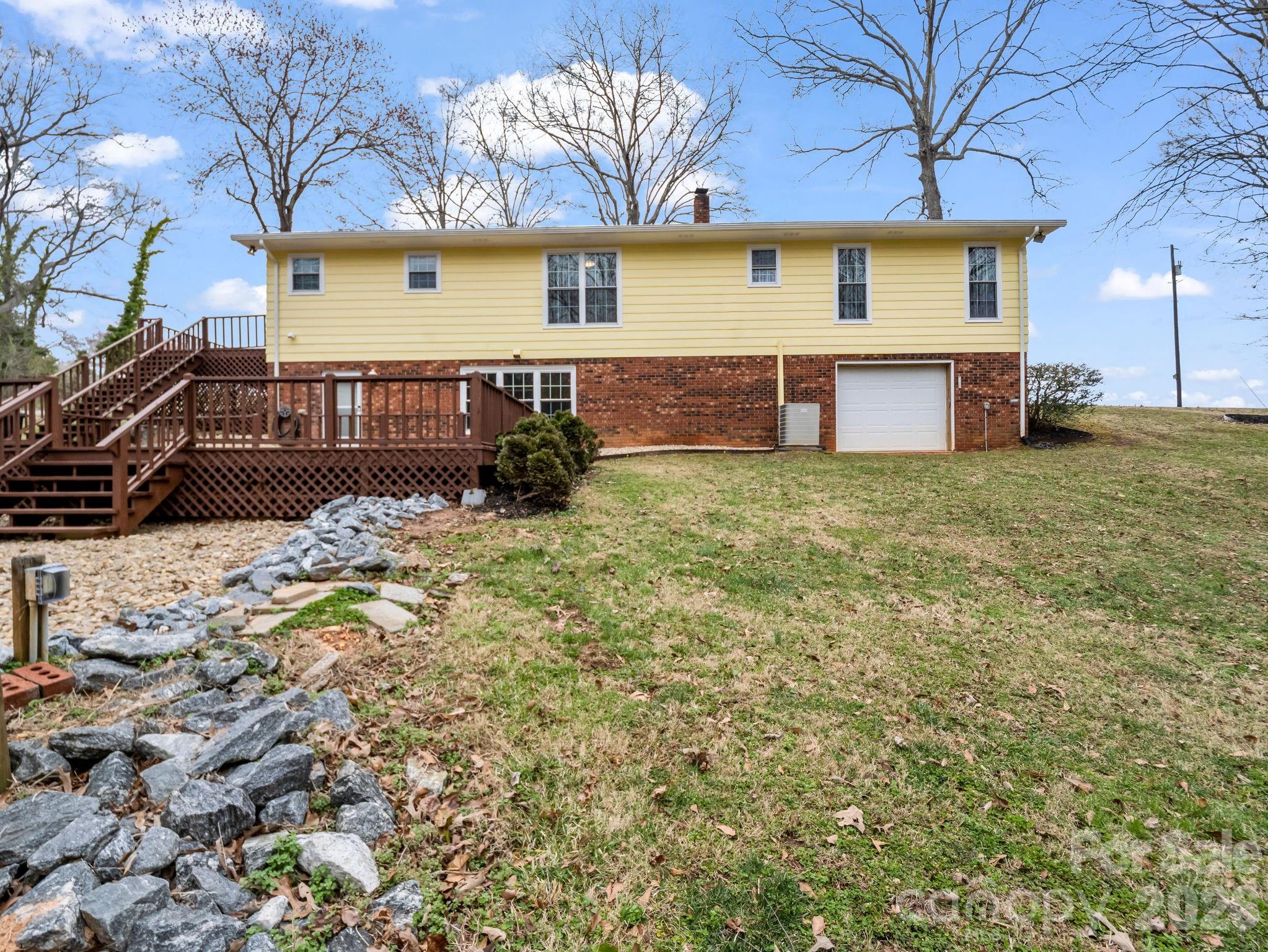 315 Walker Store Road Ellenboro, NC 28040 - Photo 33 of 39 a view of a house with a yard