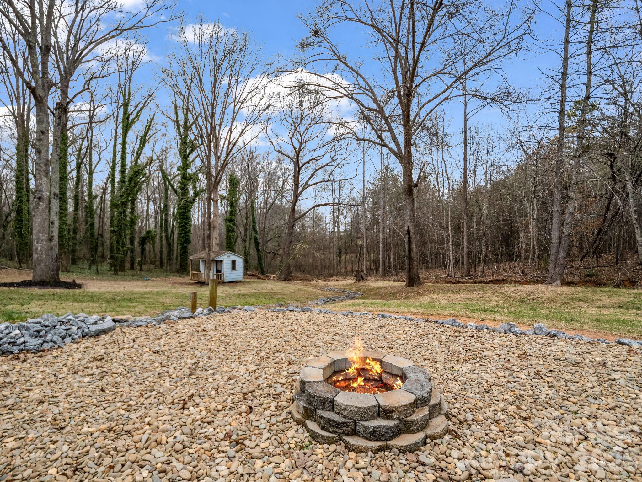315 Walker Store Road Ellenboro, NC 28040 - Photo 35 of 39 a view of a backyard with of swings