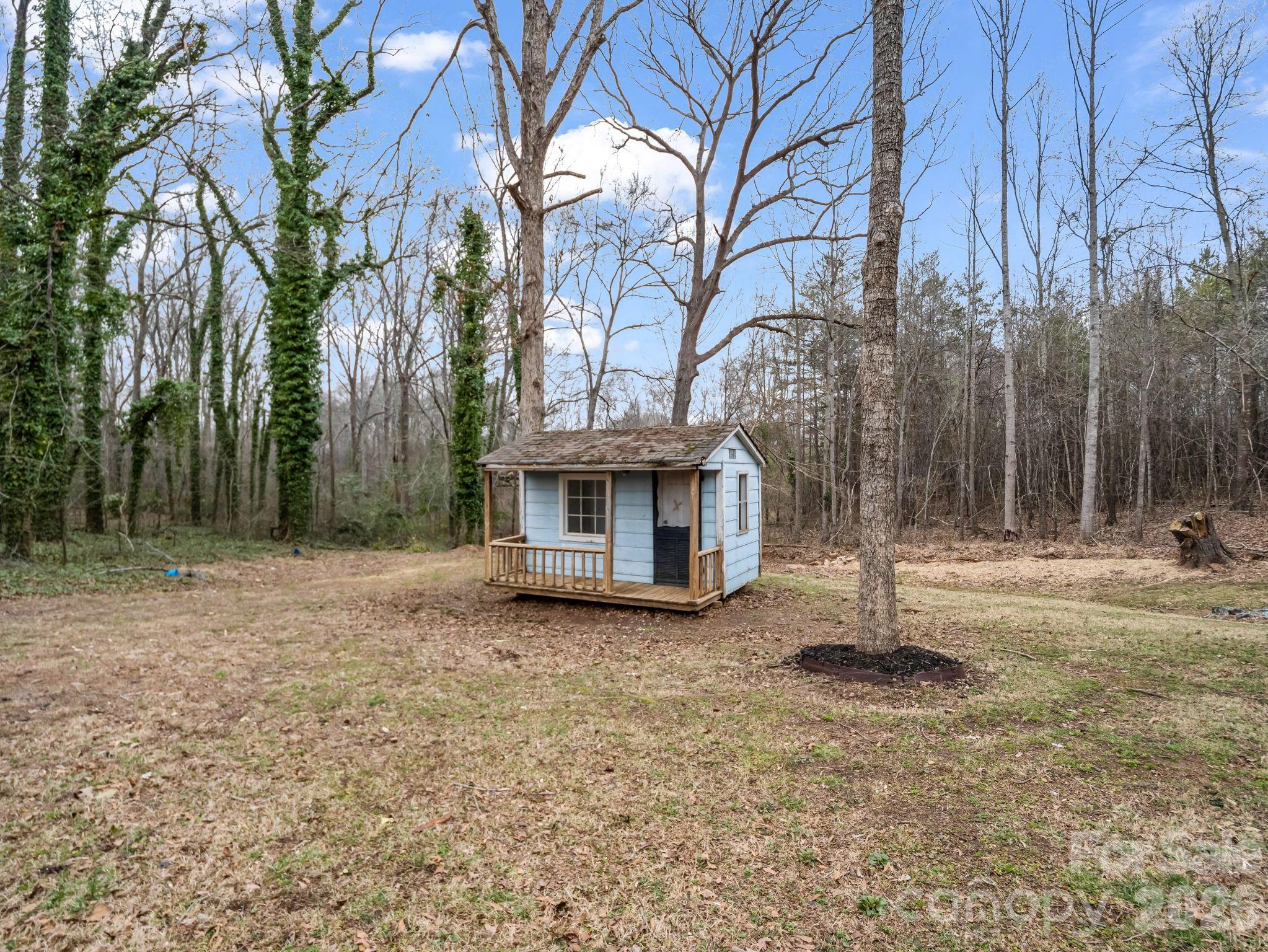 315 Walker Store Road Ellenboro, NC 28040 - Photo 36 of 39 a view of a house with a tree in the background