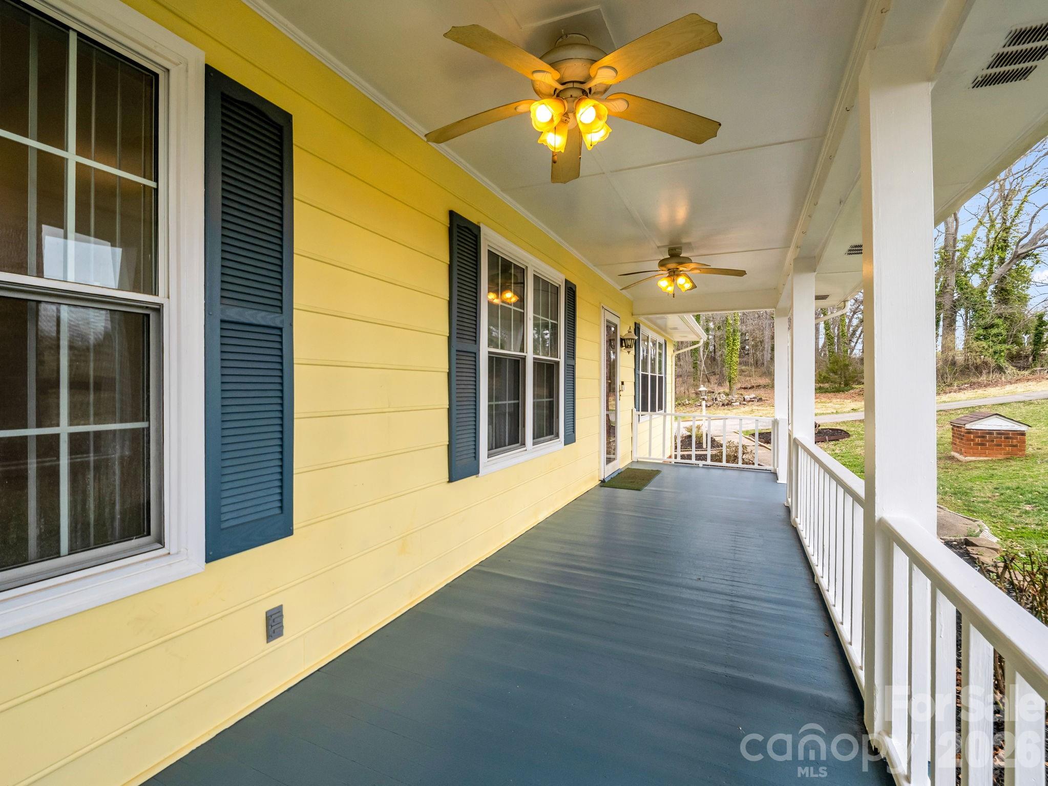 315 Walker Store Road Ellenboro, NC 28040 - Photo 4 of 39 a view of an entryway with wooden floor and a ceiling fan