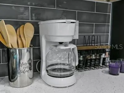 a close view of a fireplace in a room and racks