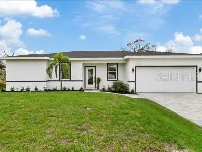 a view of front of house with a yard