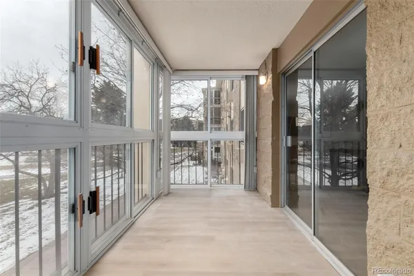 a view of a room with a large window