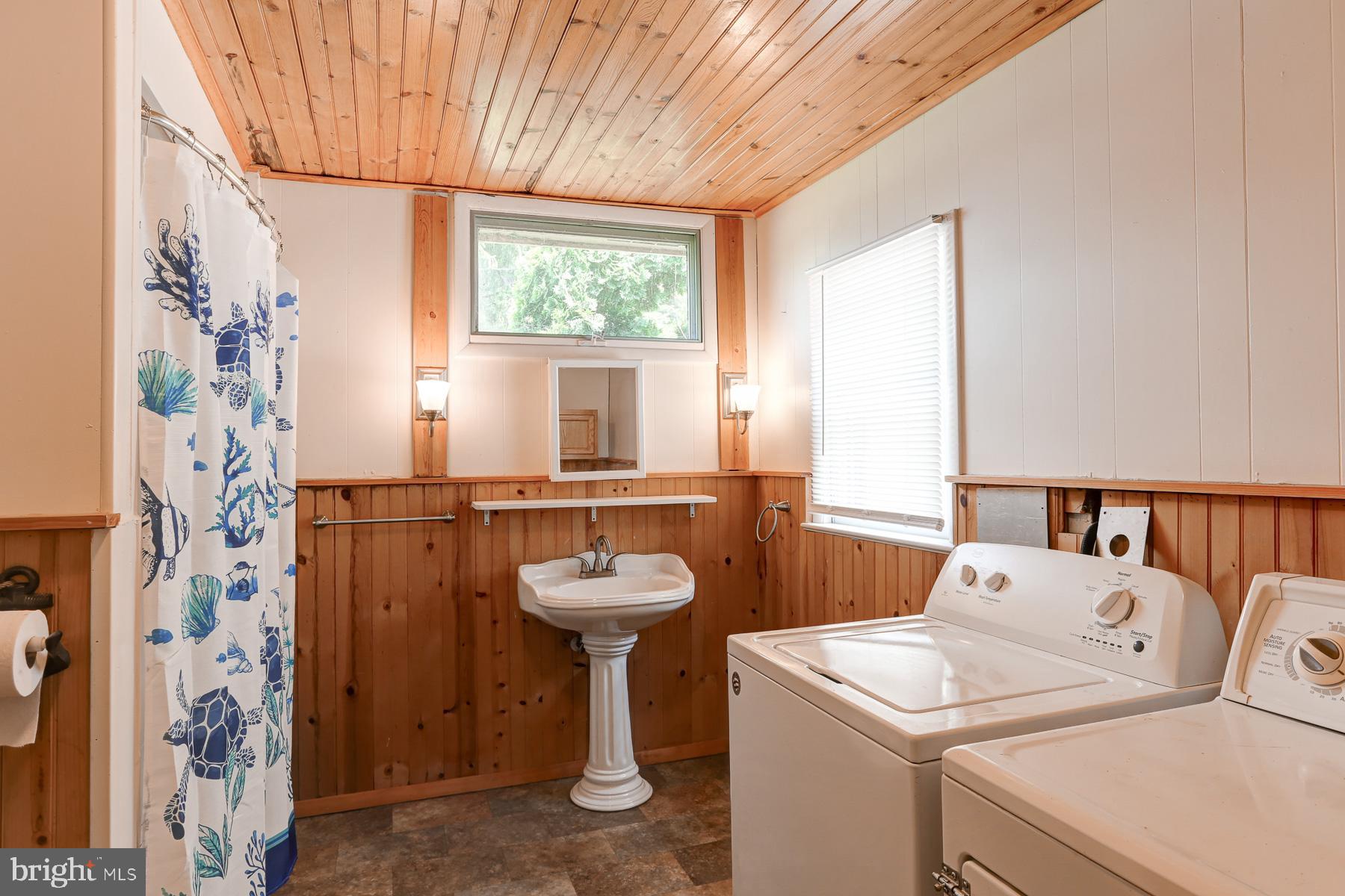 823 Silver Lake Road Lewisberry, PA 17339 - Photo 11 of 24 a bathroom with a sink and mirror with toilet