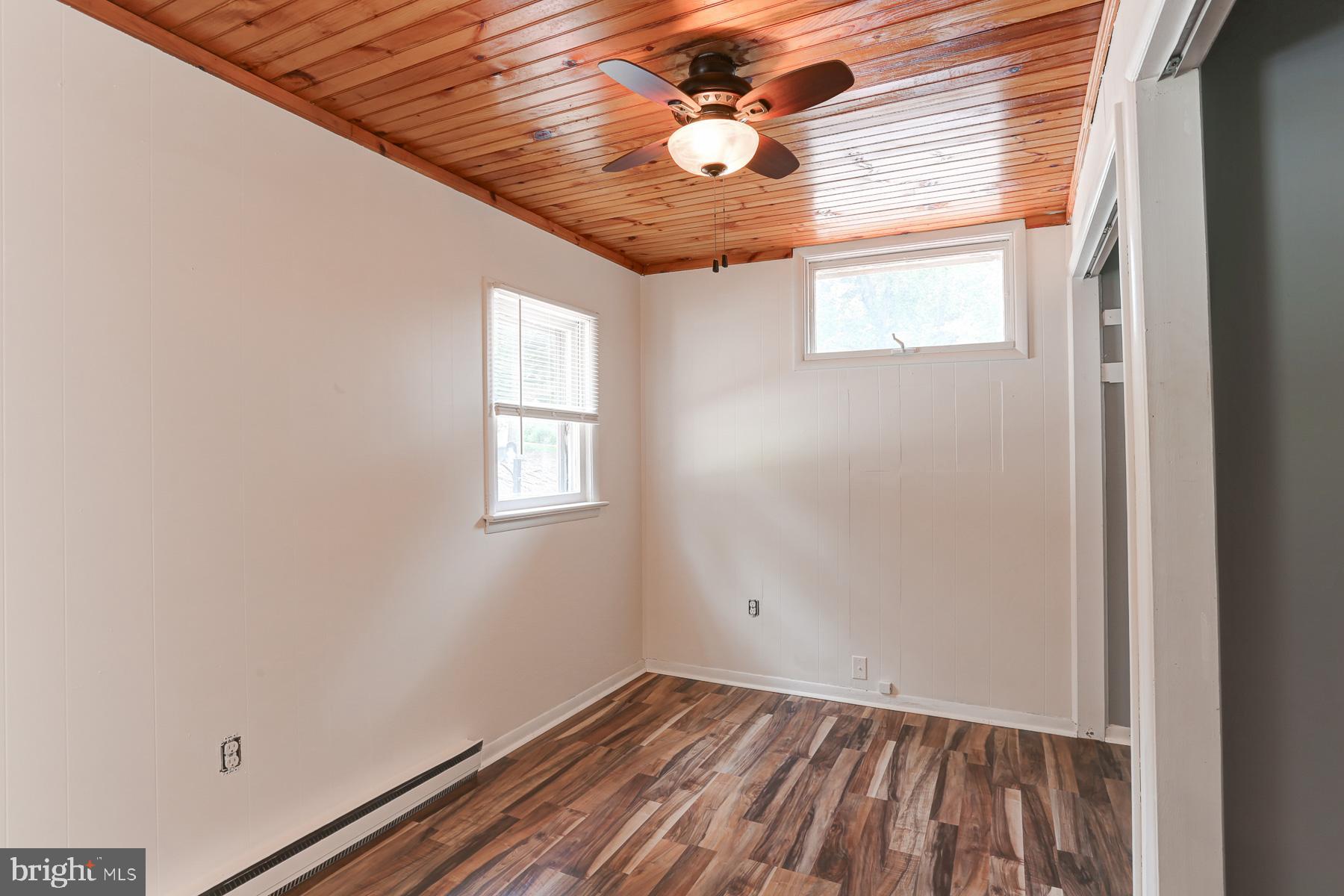 823 Silver Lake Road Lewisberry, PA 17339 - Photo 14 of 24 a view of room with window and ceiling fan