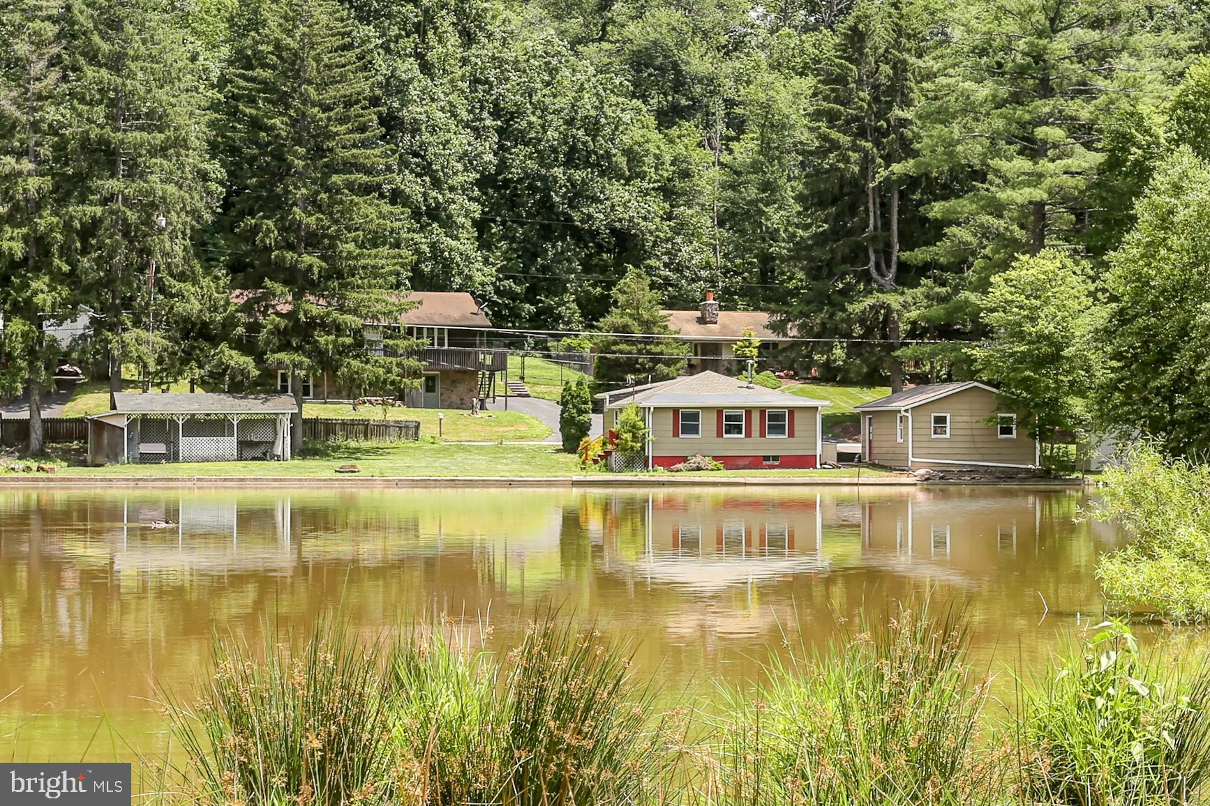 823 Silver Lake Road Lewisberry, PA 17339 - Photo 23 of 24 a view of a swimming pool with a yard