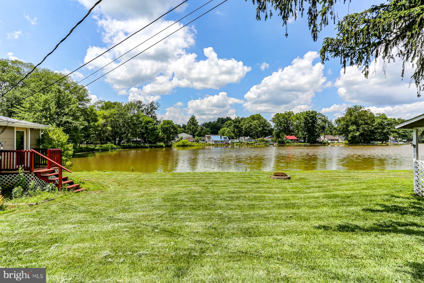 823 Silver Lake Road Lewisberry, PA 17339 - Photo 5 of 24 a view of a lake with a yard