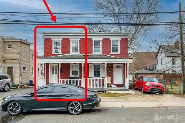 a car parked in front of a building
