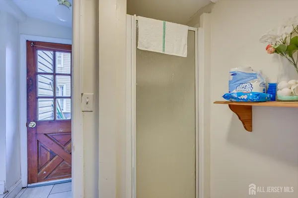 a close view of a utility room with washer and dryer