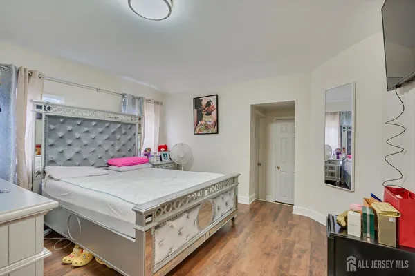 a bed room with a bed and a table