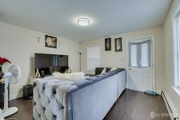 a bed room with bed and a window
