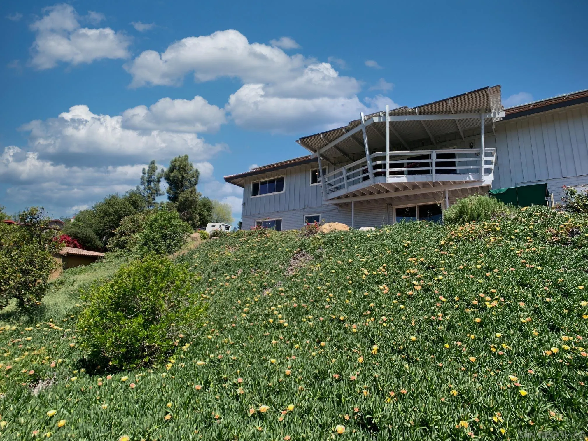 1958 Highlands View Road Alpine, CA 91901 - Photo 54 of 58 a backyard of a house with lots of green space