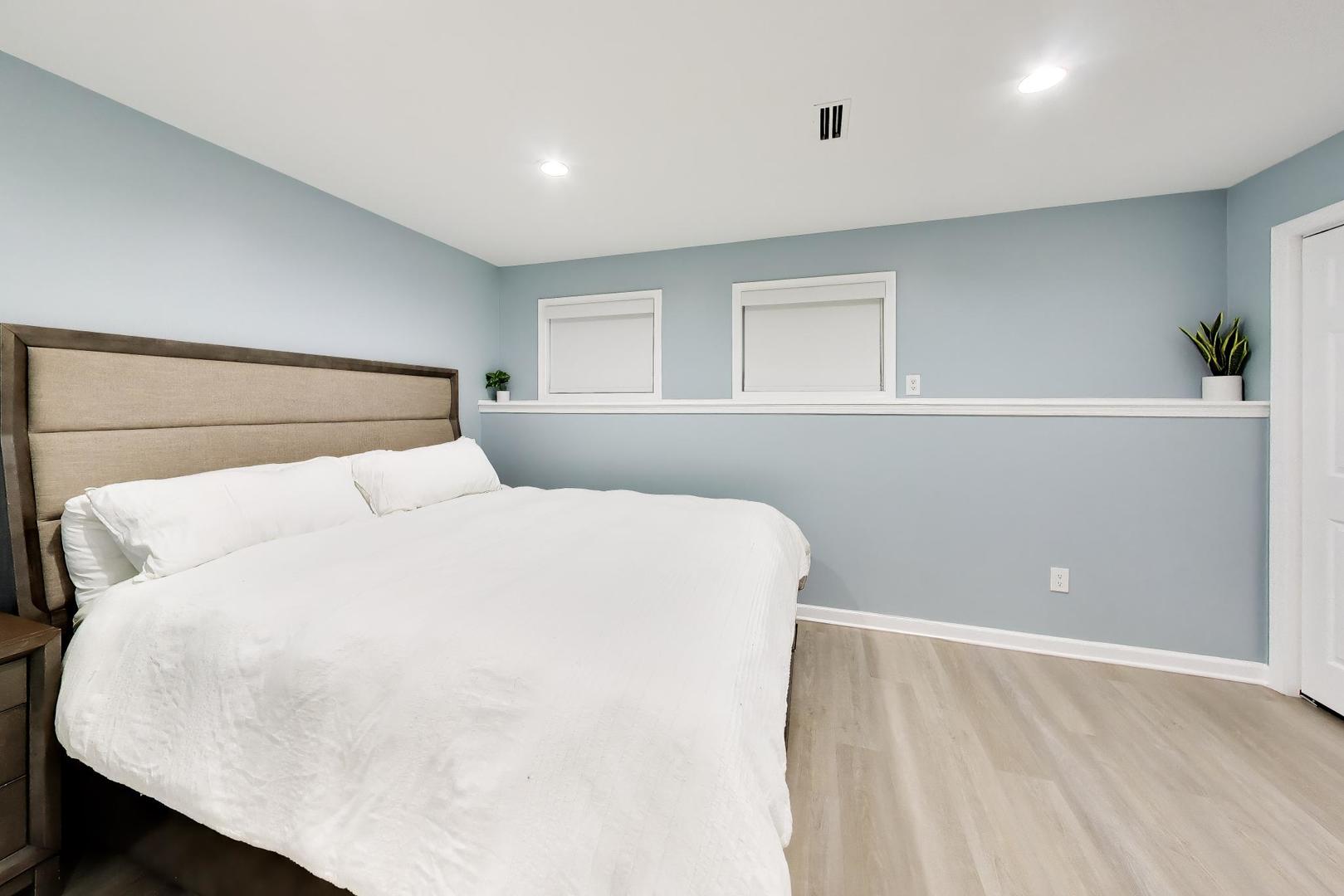 232 West Scott Street Chicago, IL 60610 - Photo 25 of 39 a large white bed in a white room