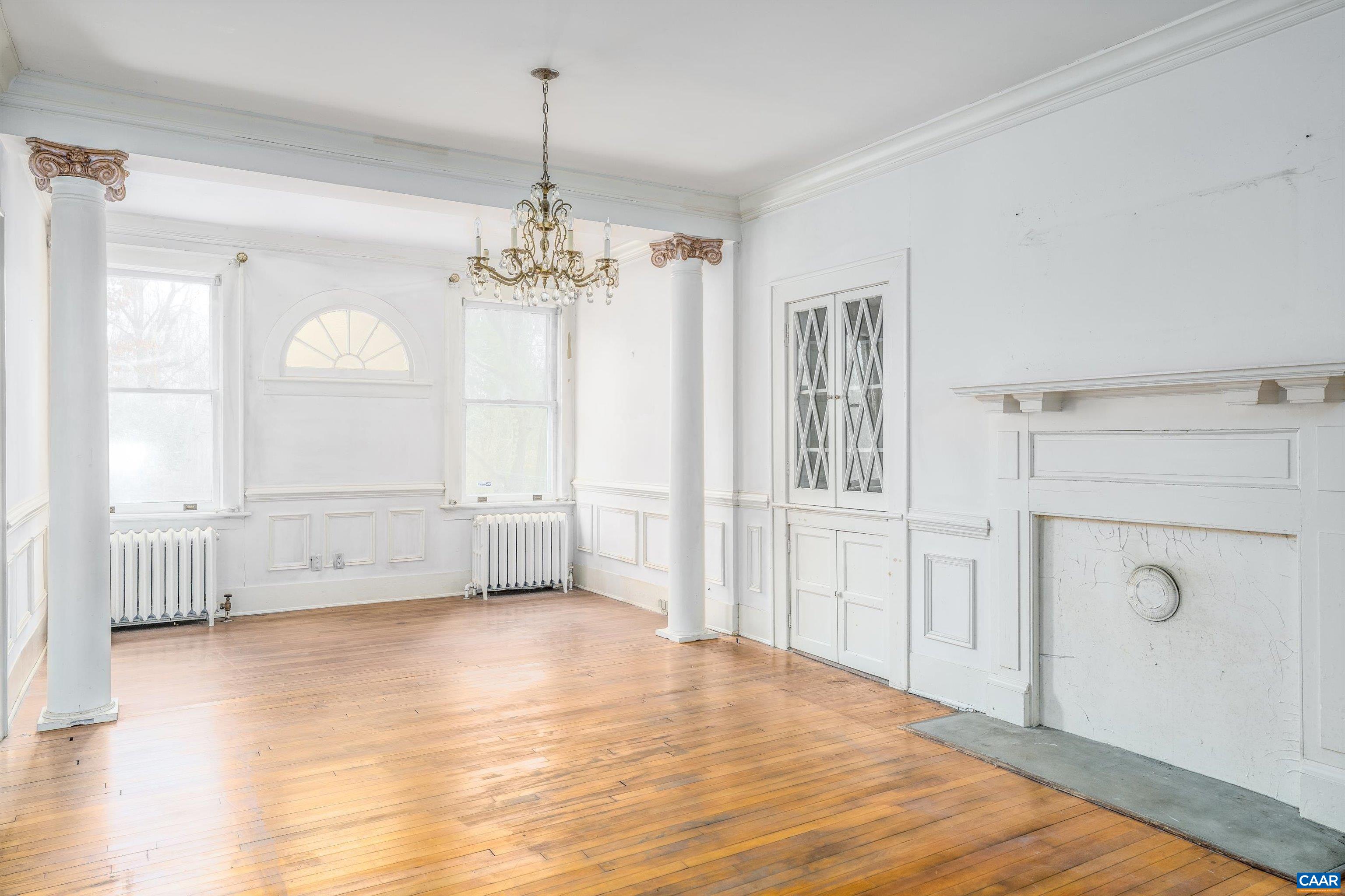 278 James River Road Scottsville, VA 24590 - Photo 20 of 59 a view of an empty room with wooden floor and a window