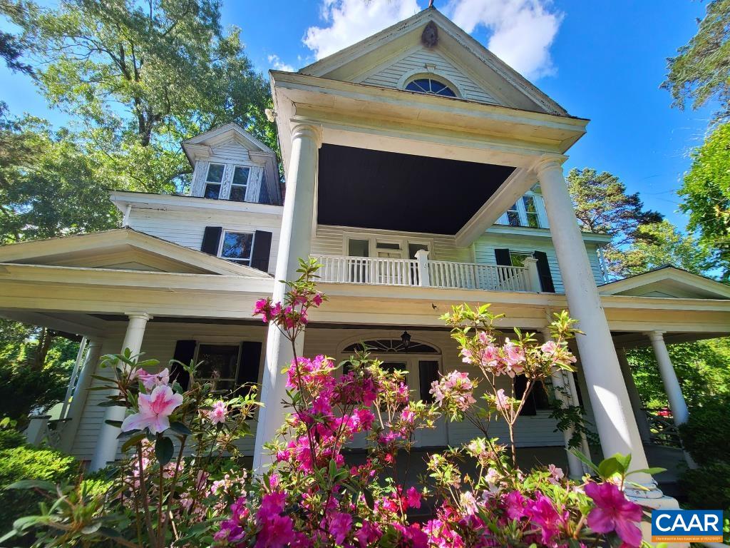 278 James River Road Scottsville, VA 24590 - Photo 3 of 59 a view of a house with a flower garden