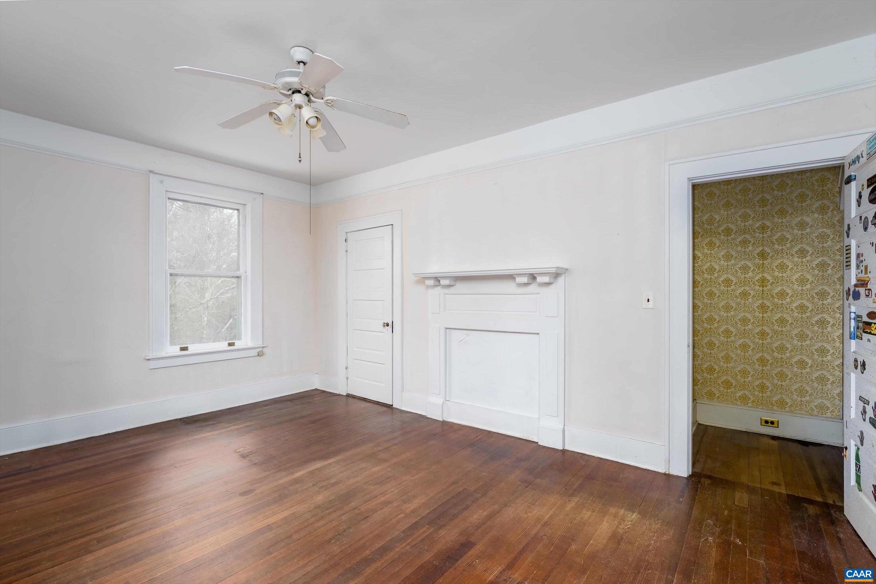 278 James River Road Scottsville, VA 24590 - Photo 38 of 59 wooden floor in an empty room with a window