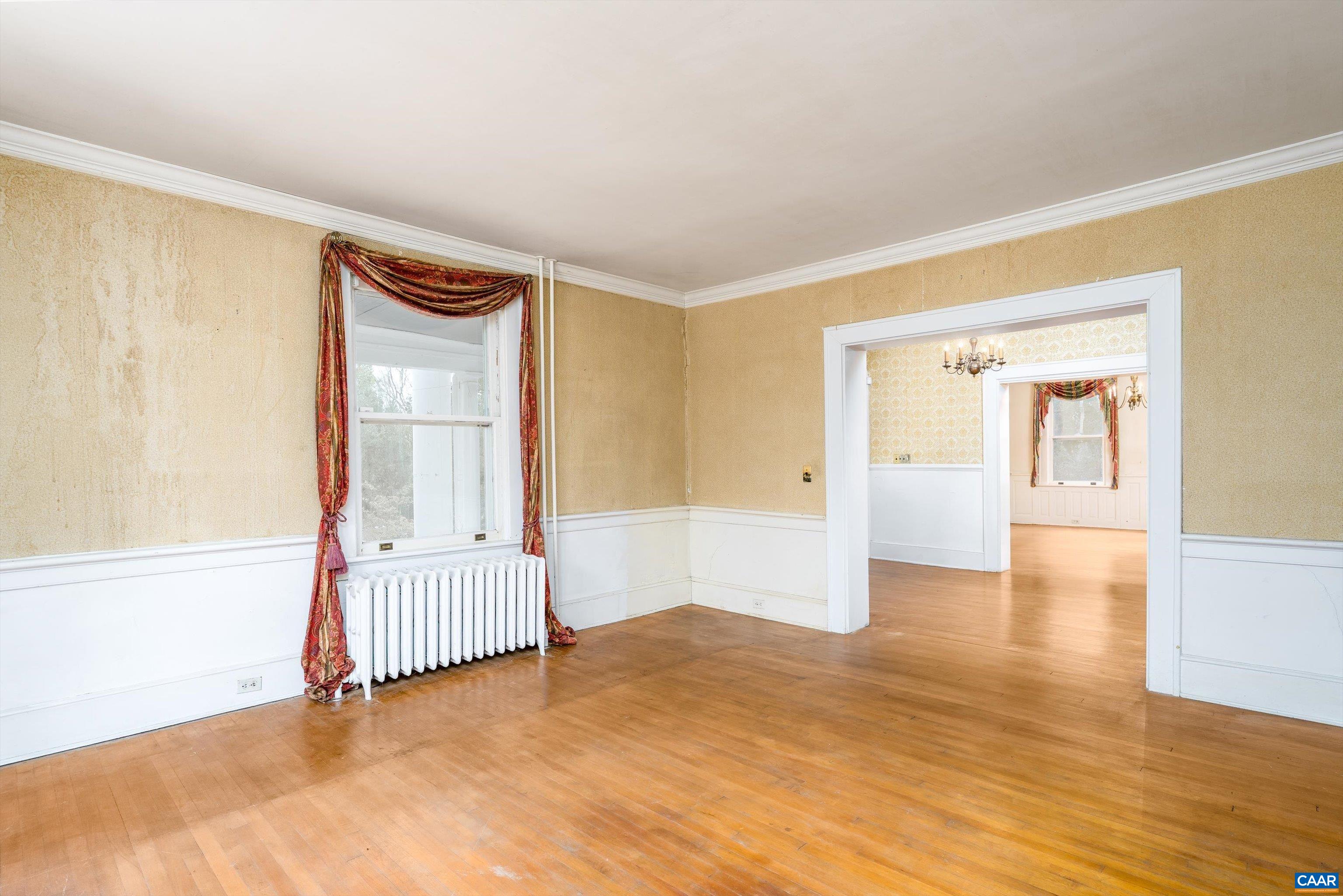 278 James River Road Scottsville, VA 24590 - Photo 8 of 59 a view of empty room with wooden floor and fan