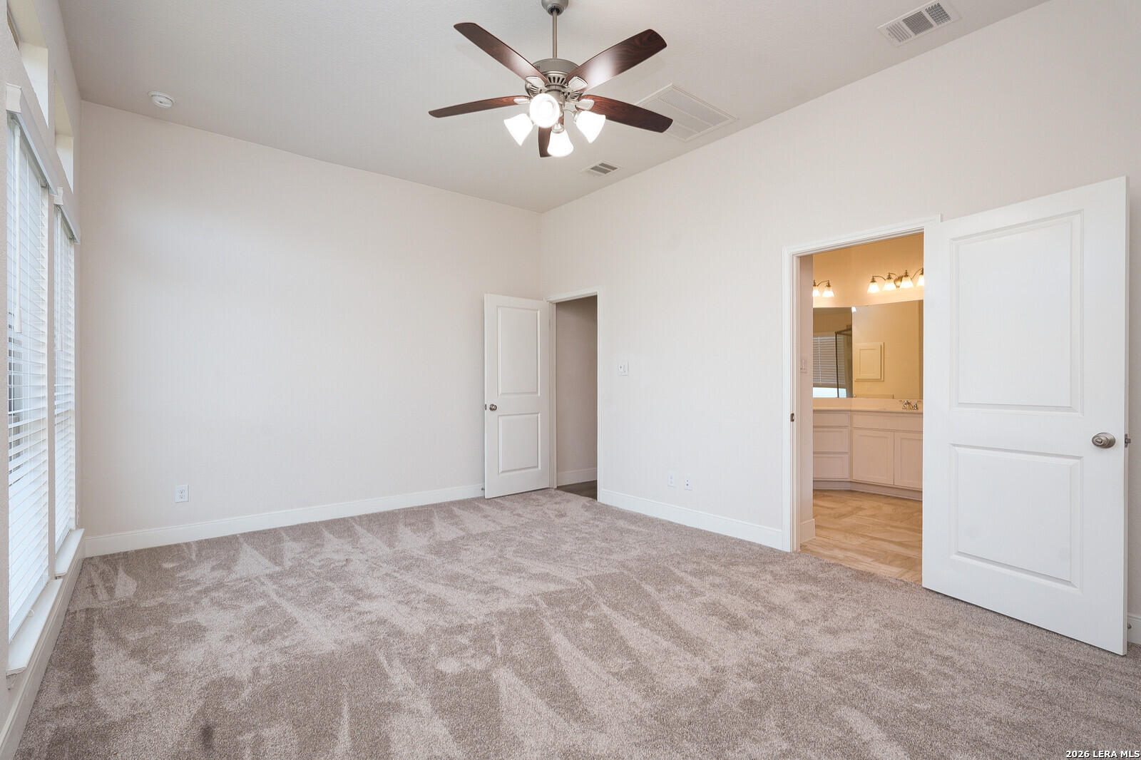 3654 Braford Way Bulverde, TX 78163 - Photo 16 of 32 a view of an empty room and chandelier fan