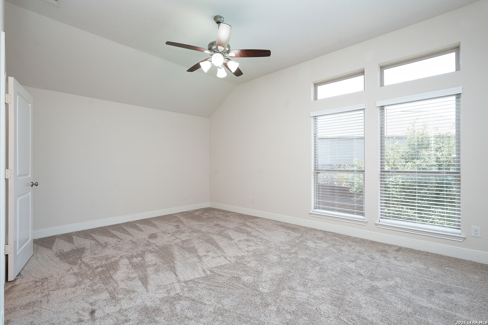 3654 Braford Way Bulverde, TX 78163 - Photo 17 of 32 a view of an empty room with a window