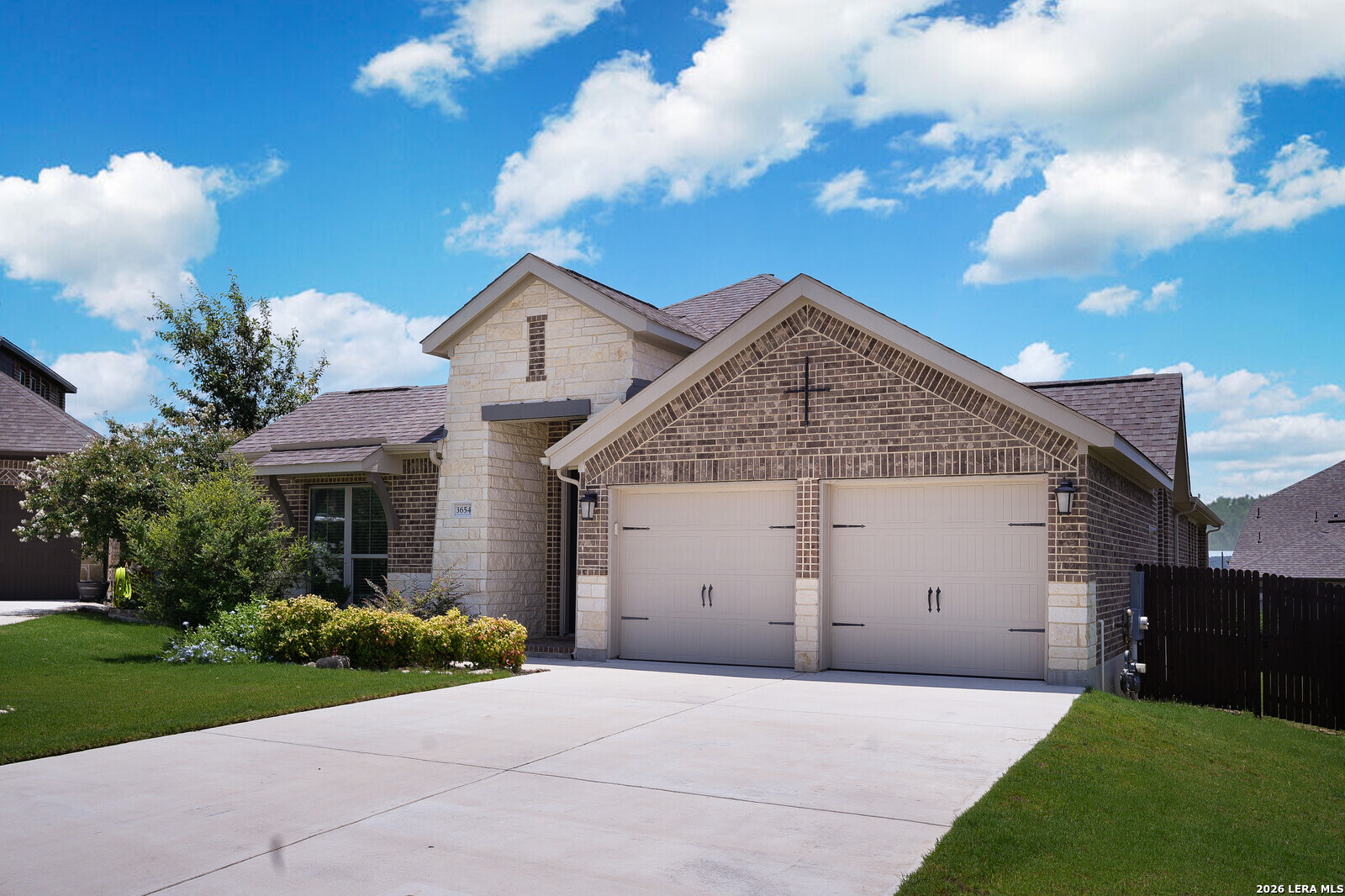 3654 Braford Way Bulverde, TX 78163 - Photo 3 of 32 a view of a house with a yard and potted plants