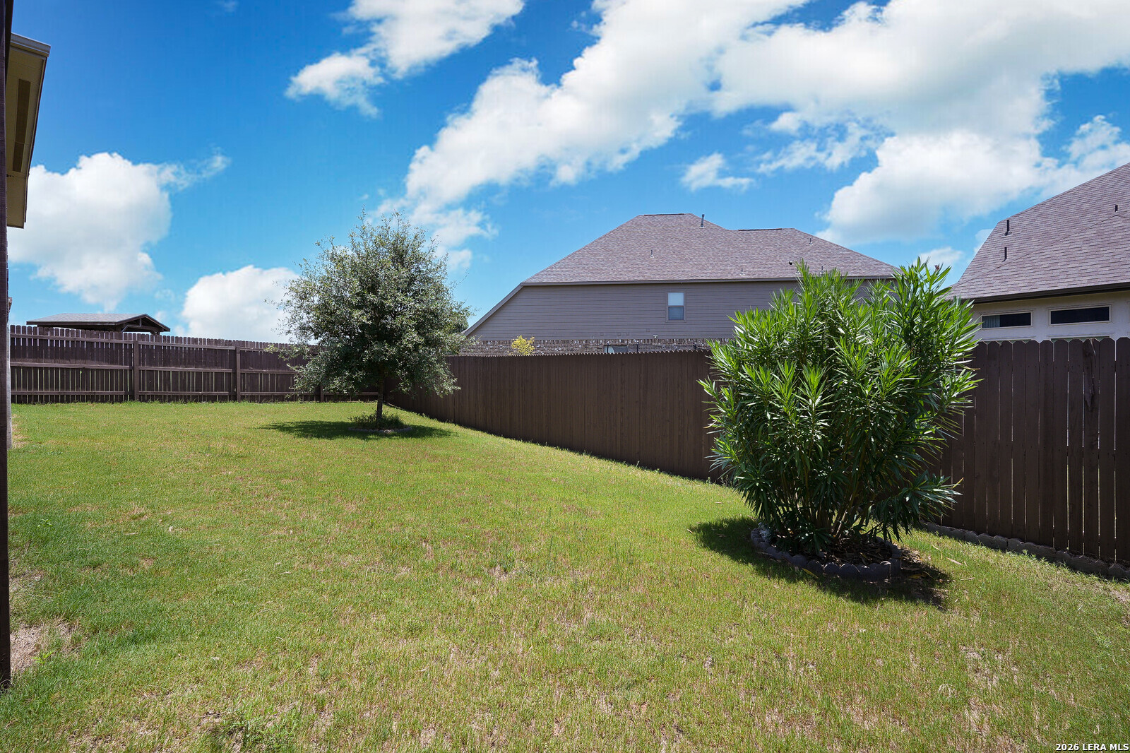 3654 Braford Way Bulverde, TX 78163 - Photo 31 of 32 a view of a garden with a house