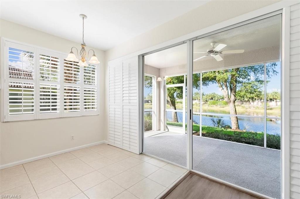 7092 Timberland Circle, Unit 1101 Naples, FL 34109 - Photo 14 of 48 a view of a room with a large window