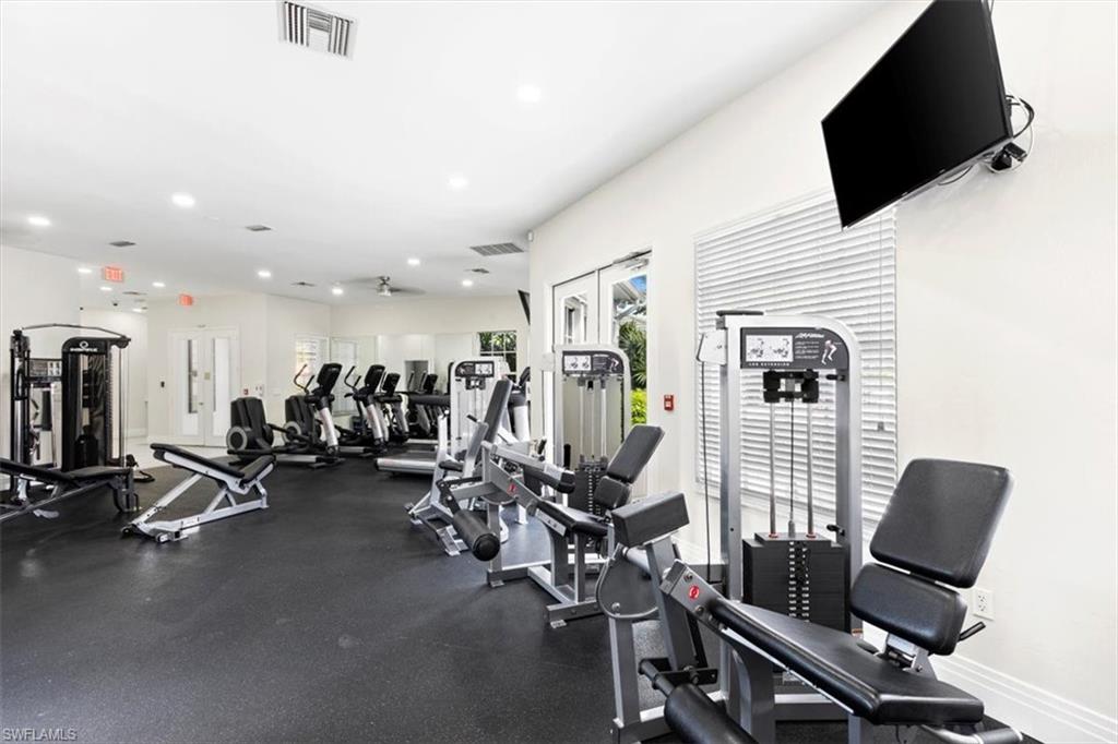 7092 Timberland Circle, Unit 1101 Naples, FL 34109 - Photo 39 of 48 a view of a room with gym equipment