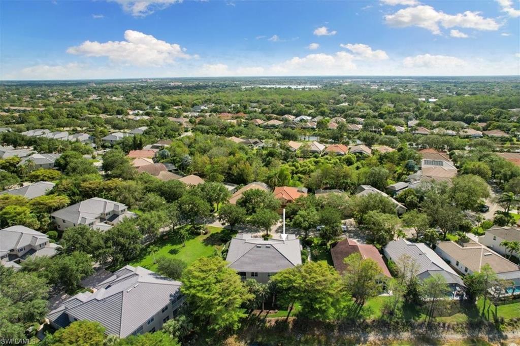 7092 Timberland Circle, Unit 1101 Naples, FL 34109 - Photo 47 of 48 an aerial view of a city