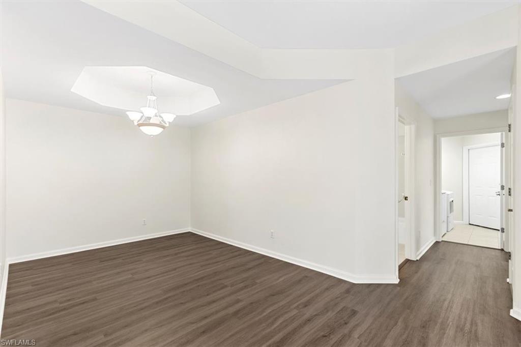 7092 Timberland Circle, Unit 1101 Naples, FL 34109 - Photo 7 of 48 a view of a room with wooden floor