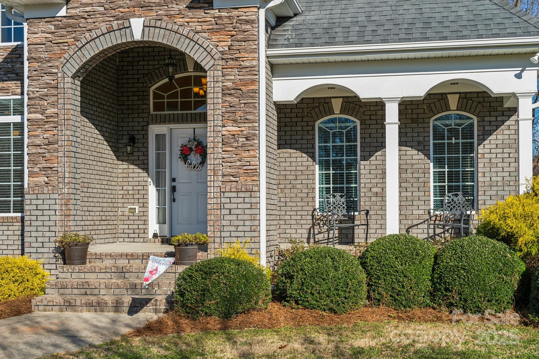 4006 Sincerity Road Monroe, NC 28110 - Photo 2 of 36 a front view of a house with plants