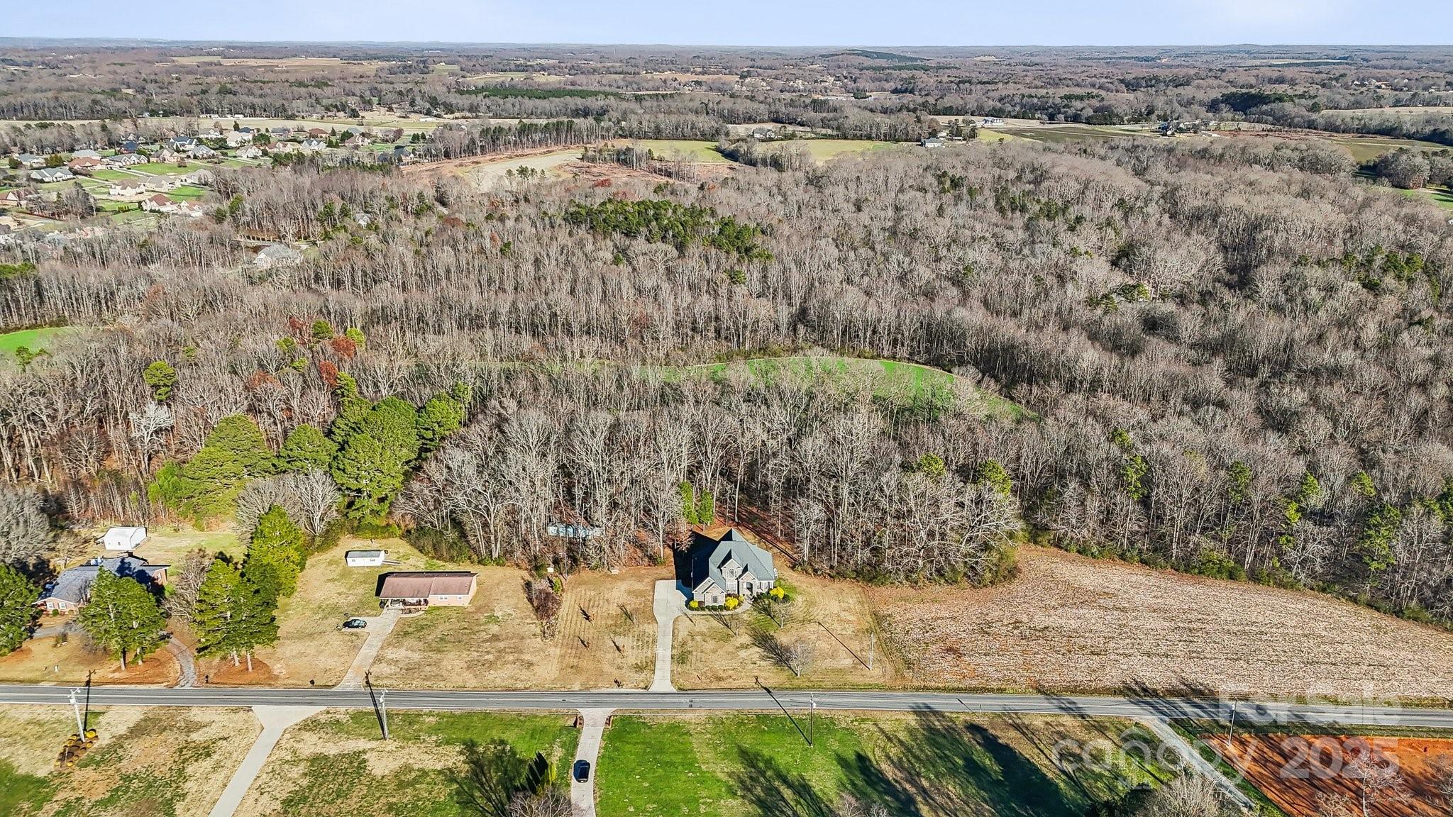 4006 Sincerity Road Monroe, NC 28110 - Photo 26 of 36 an aerial view of a houses