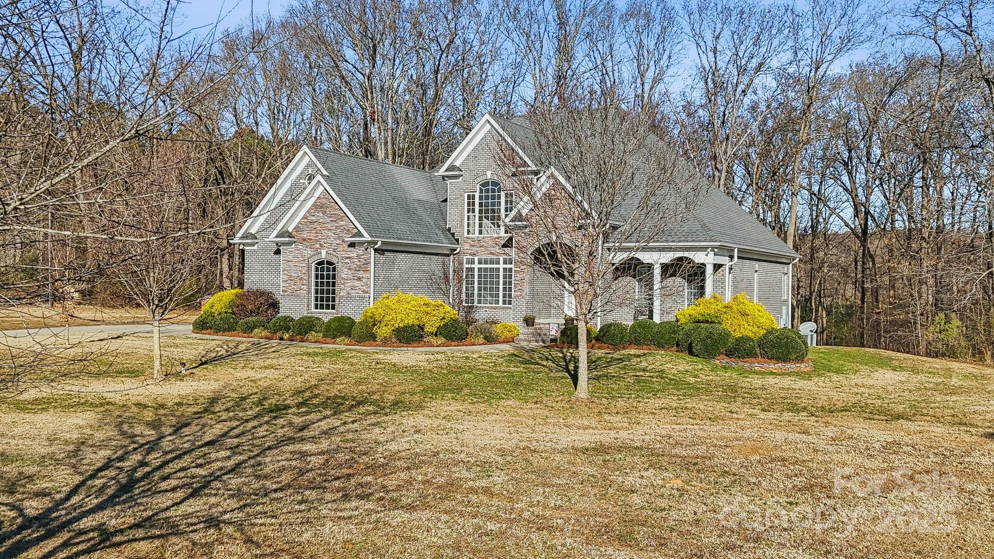 4006 Sincerity Road Monroe, NC 28110 - Photo 30 of 36 a view of a house with a yard